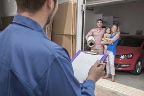 Paddington man and van unloading household items at a destination