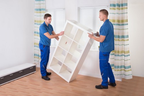 Team collecting unwanted furniture from a Paddington apartment